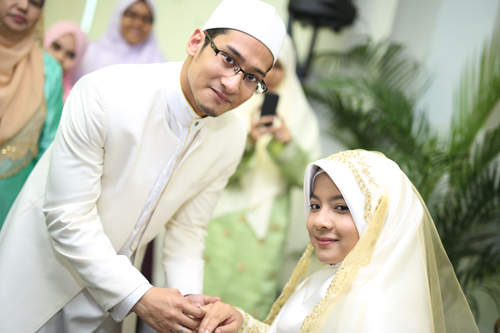 Zul and his lovely wife, Huda